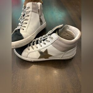 White and Black High-Top Sneakers with Star Detail